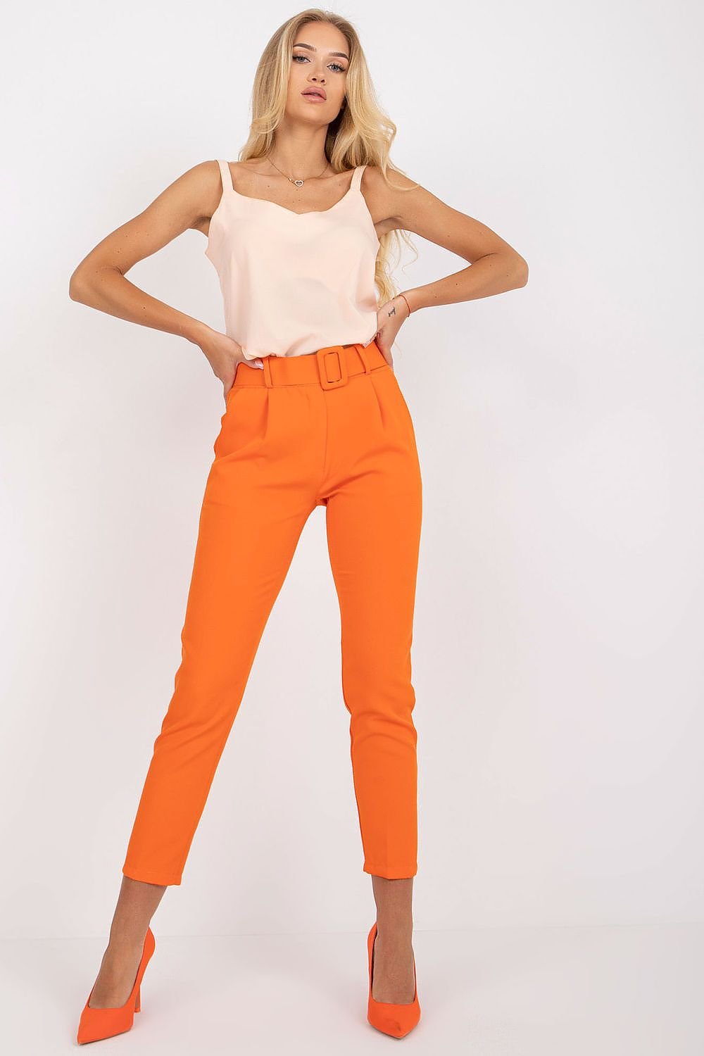 Women's high-waisted pants featuring a zipper and button closure, slip-in side pockets, and a belt for a stylish and functional look.






