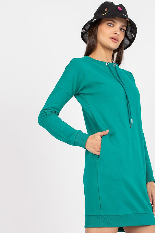 Comfortable long-sleeved tracksuit dress featuring a round neckline with a tie-up strap and slip pockets on the sides for added convenience and style.