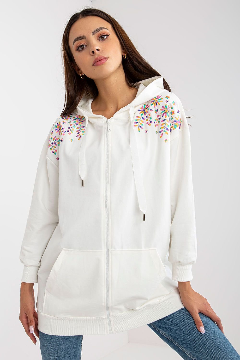 A women's zippered sweatshirt with long sleeves, a cozy hood, and a front pocket, featuring unique embroidery on the shoulders for a stylish touch. Ideal for casual wear with a modern flair.






