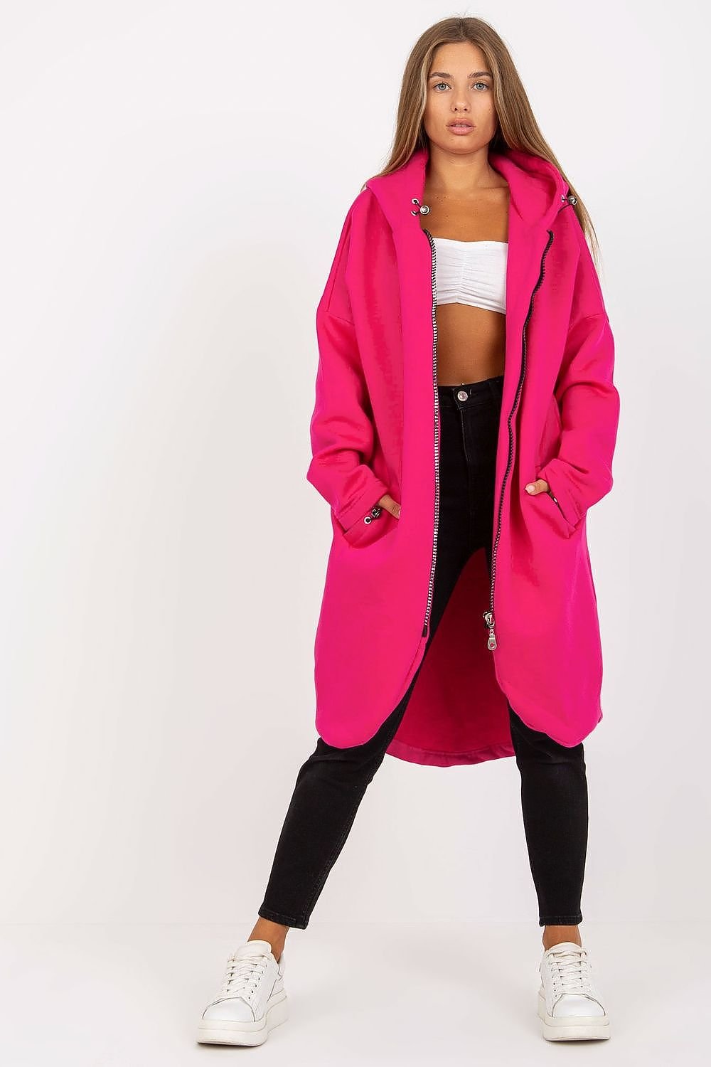 An elongated pink sweatshirt with a zip-up design, long sleeves, an attached hood, and slip-in side pockets. Ideal for casual comfort and style.






