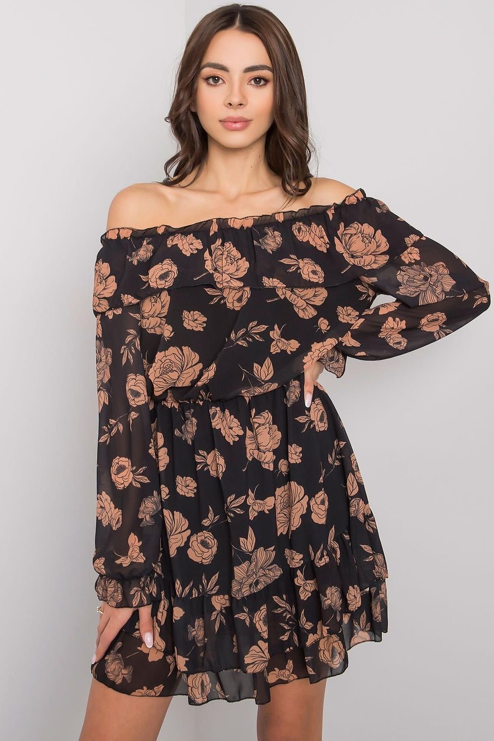 This elegant dress features long sleeves and a flattering Spanish-style neckline, adding a bold and graceful touch. The dress is fully lined for comfort, while the bottom is beautifully adorned with delicate frills, enhancing its feminine charm. A perfect blend of classic style and modern flair, ideal for both casual and more formal occasions.






