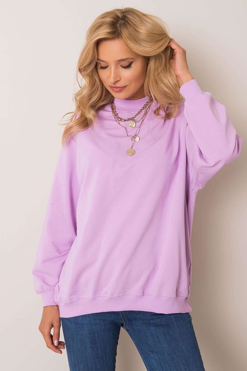 A women's cotton sweatshirt with long sleeves and a stand-up collar, crafted from high-quality, breathable material for exceptional comfort. Ideal for pairing with tight pants or skirts for a stylish and versatile look.






