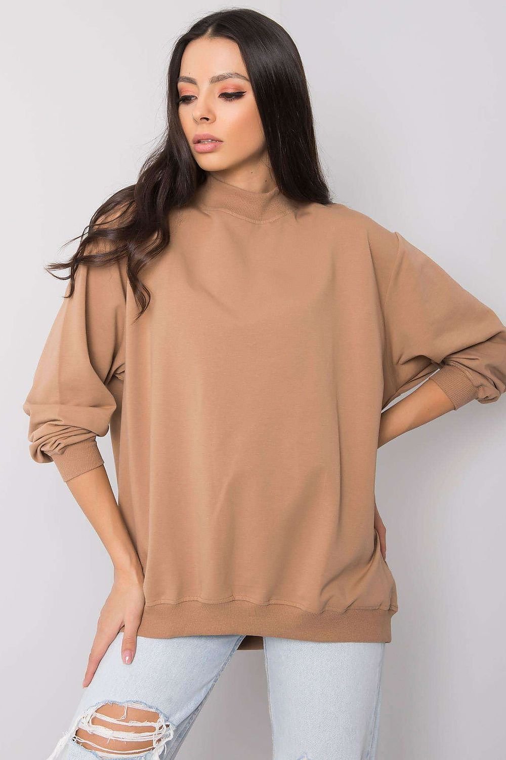 A women's beige cotton sweatshirt with long sleeves and a stand-up collar, crafted from high-quality, breathable material for exceptional comfort. Ideal for pairing with tight pants or skirts for a stylish and versatile look.






