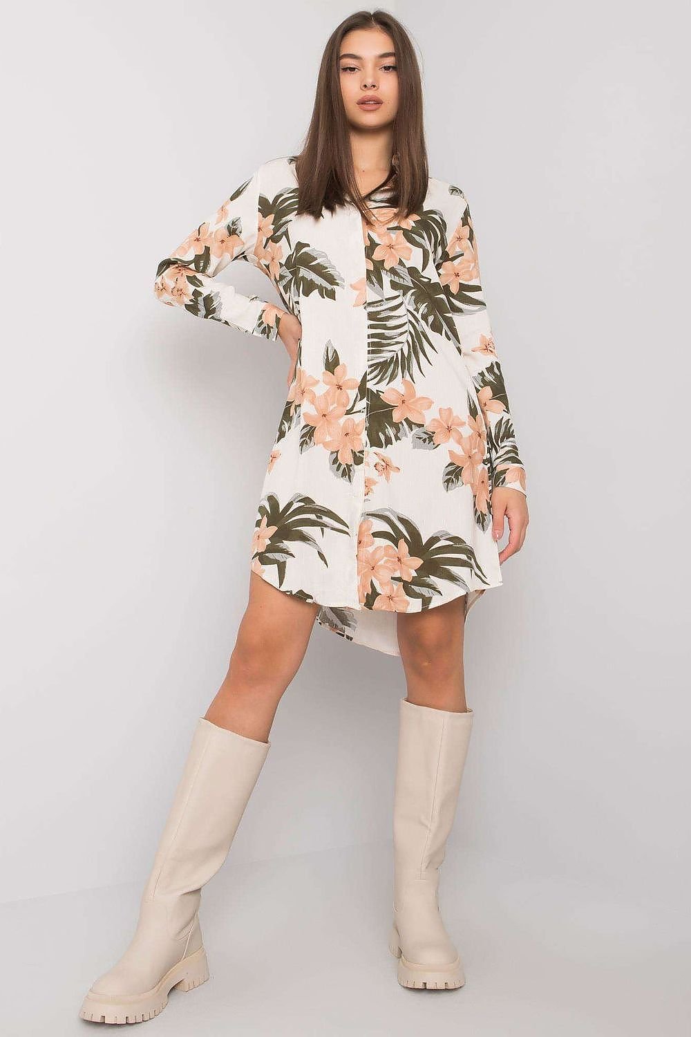 Charming floral and leaves print long-sleeve dress with button-down closure. Perfect for everyday wear, offering a stylish and comfortable option for casual outings.