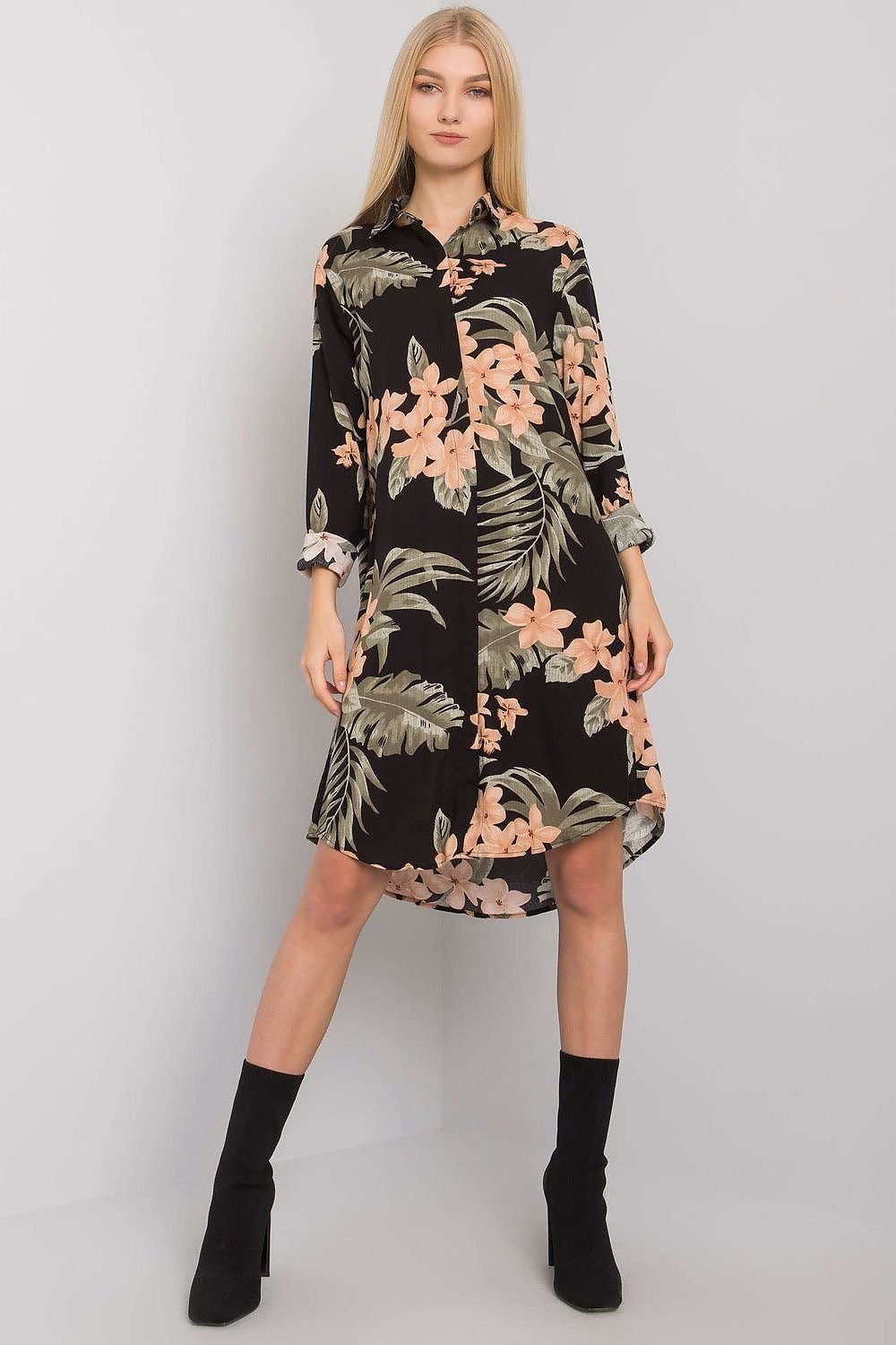 Charming floral and leaves print long-sleeve dress with button-down closure. Perfect for everyday wear, offering a stylish and comfortable option for casual outings.