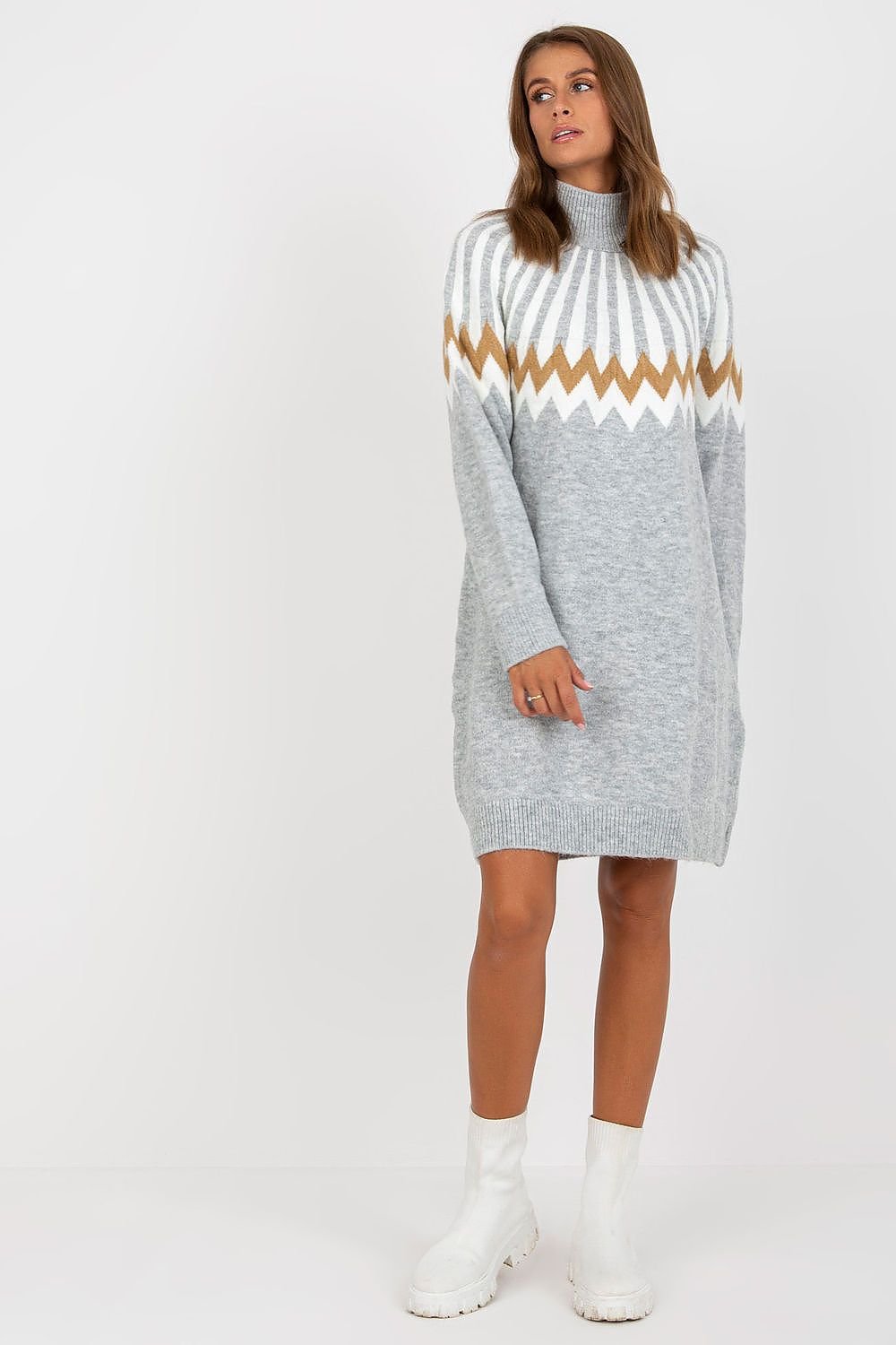 Cozy knitted dress with long sleeves and a turtleneck, featuring a distinctive geometric pattern. Ideal for everyday wear or more formal occasions, offering both style and comfort.






