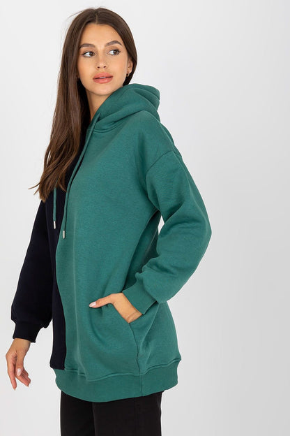  Stylish women's two-color sweatshirt with long sleeves, a cozy hood, and convenient side slip pockets for added comfort and practicality.