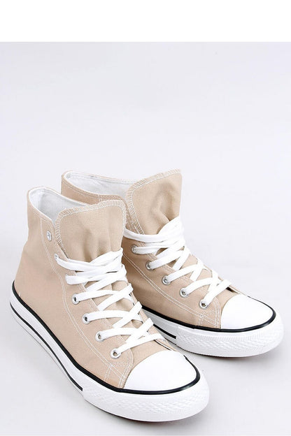 Classic women's canvas ankle sneakers, a must-have for every wardrobe. Made from fabric for both outer and inner materials, these sneakers offer comfort with every step while maintaining a timeless design. Perfect for casual, everyday wear.






