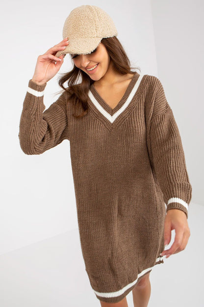 Charming knit dress with long sleeves and a flattering heart-shaped neckline, perfect for a variety of occasions.