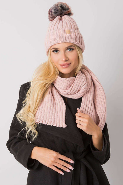 A cozy winter set featuring a hat and scarf, designed to keep you warm and stylish during the cold winter months. The perfect combination for the upcoming season.






