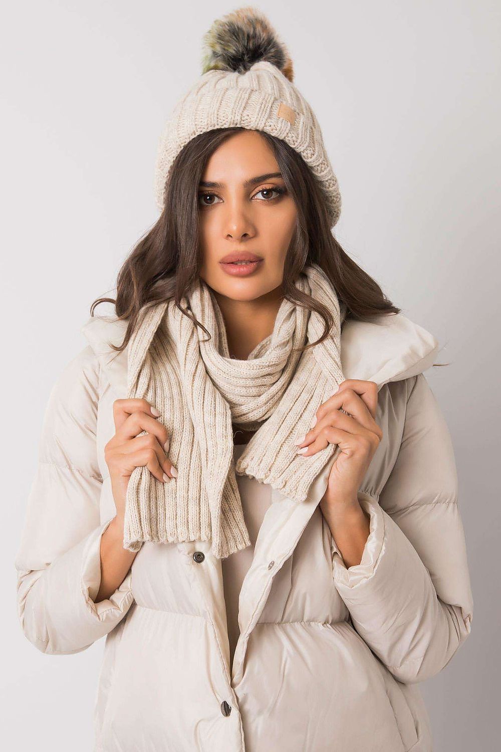 A cozy winter set featuring a hat and scarf, designed to keep you warm and stylish during the cold winter months. The perfect combination for the upcoming season.






