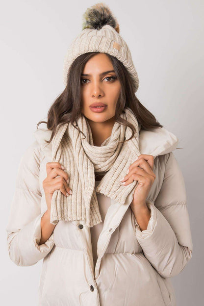 A cozy winter set featuring a hat and scarf, designed to keep you warm and stylish during the cold winter months. The perfect combination for the upcoming season.






