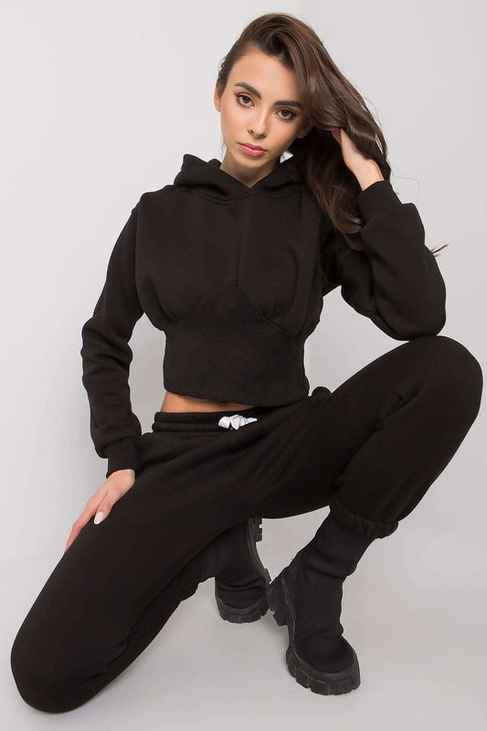 Comfortable and stylish women's sweatshirt set featuring a short hoodie with long sleeves and a hood, paired with long pants that have a waist tie and slip pockets. Ideal for casual wear or lounging, offering a perfect blend of fashion and comfort.