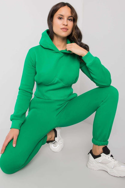 Comfortable and stylish women's sweatshirt set featuring a short hoodie with long sleeves and a hood, paired with long pants that have a waist tie and slip pockets. Ideal for casual wear or lounging, offering a perfect blend of fashion and comfort.