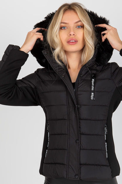 A stylish quilted down jacket with long sleeves, a zip and press-stud closure, and zippered pockets. Fully lined for warmth, it features a detachable hood with decorative fur, offering both functionality and elegance.