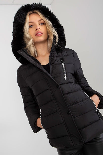 A stylish quilted down jacket with long sleeves, a zip and press-stud closure, and zippered pockets. Fully lined for warmth, it features a detachable hood with decorative fur, offering both functionality and elegance.