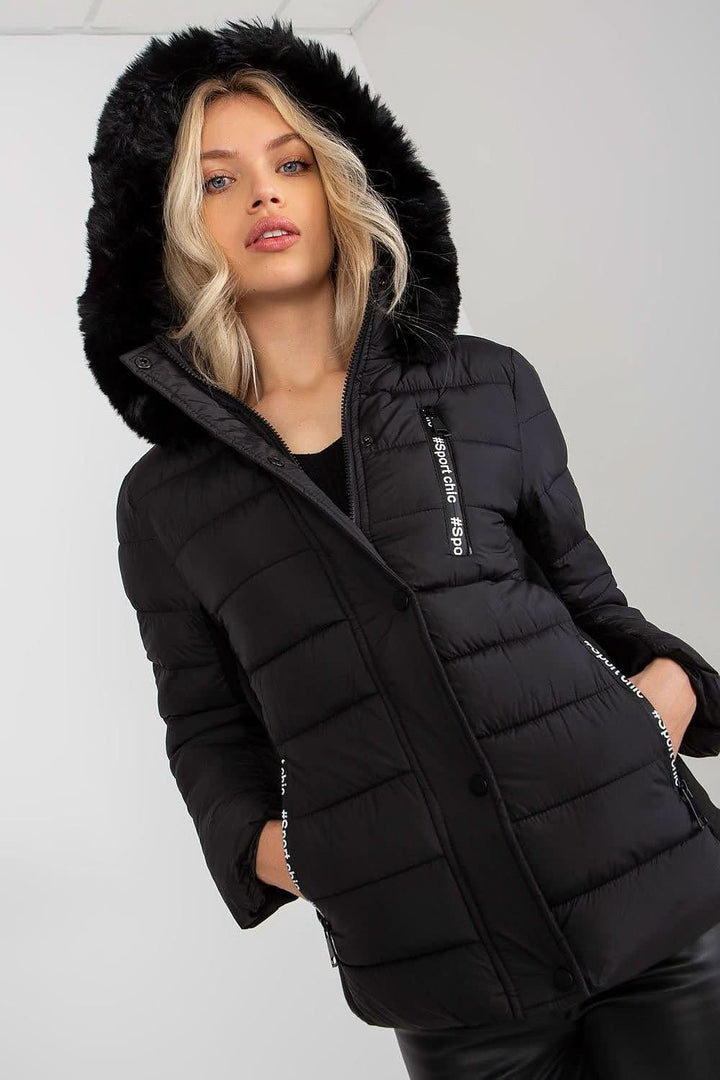 A stylish quilted down jacket with long sleeves, a zip and press-stud closure, and zippered pockets. Fully lined for warmth, it features a detachable hood with decorative fur, offering both functionality and elegance.