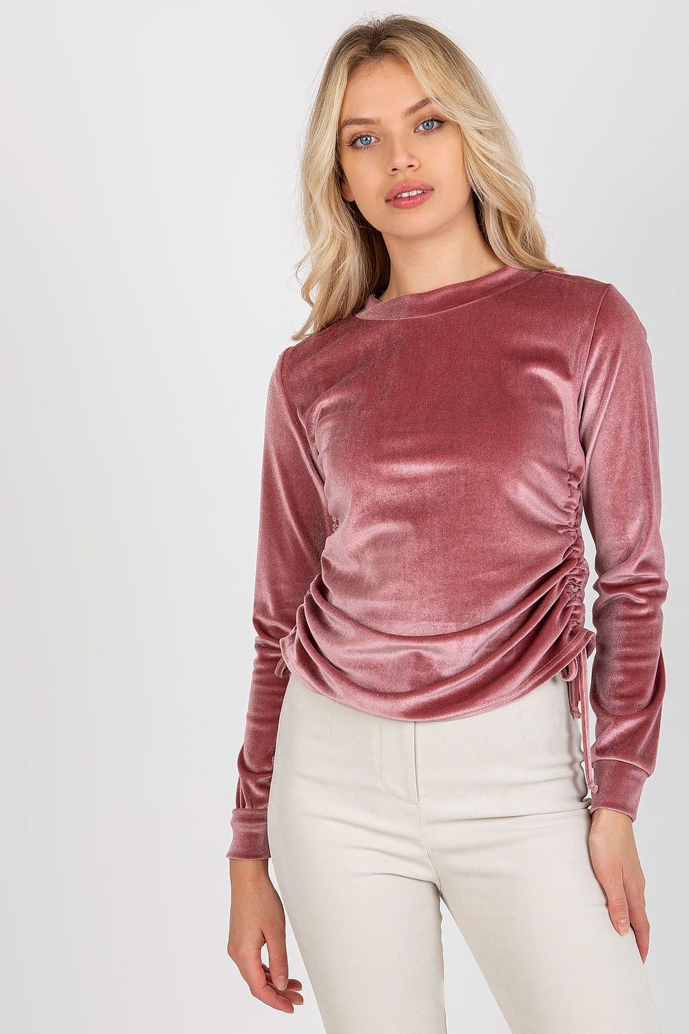 Stylish short velour blouse with long sleeves, round neckline, and adjustable side ties for a customizable fit.