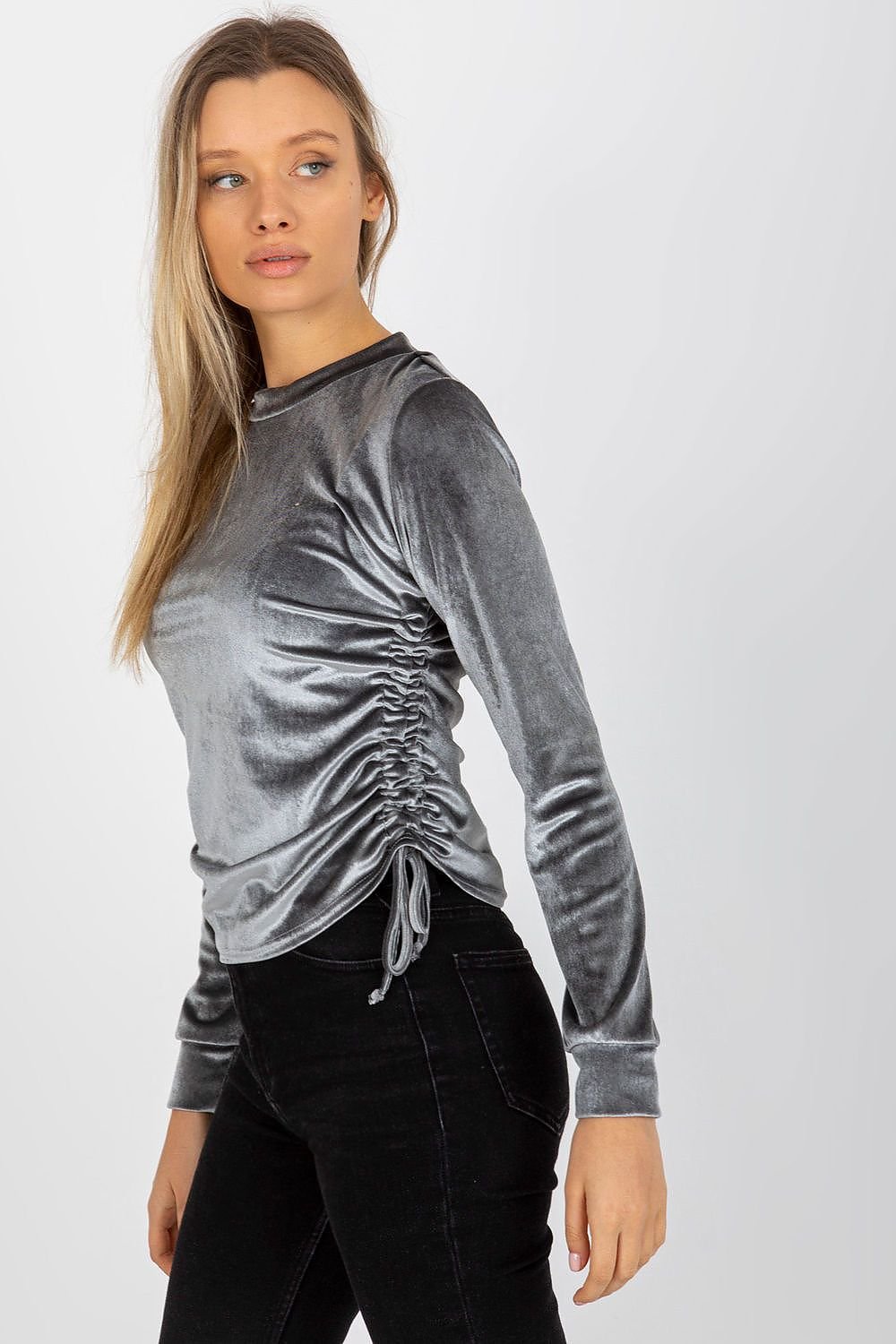 Stylish short velour blouse with long sleeves, round neckline, and adjustable side ties for a customizable fit.