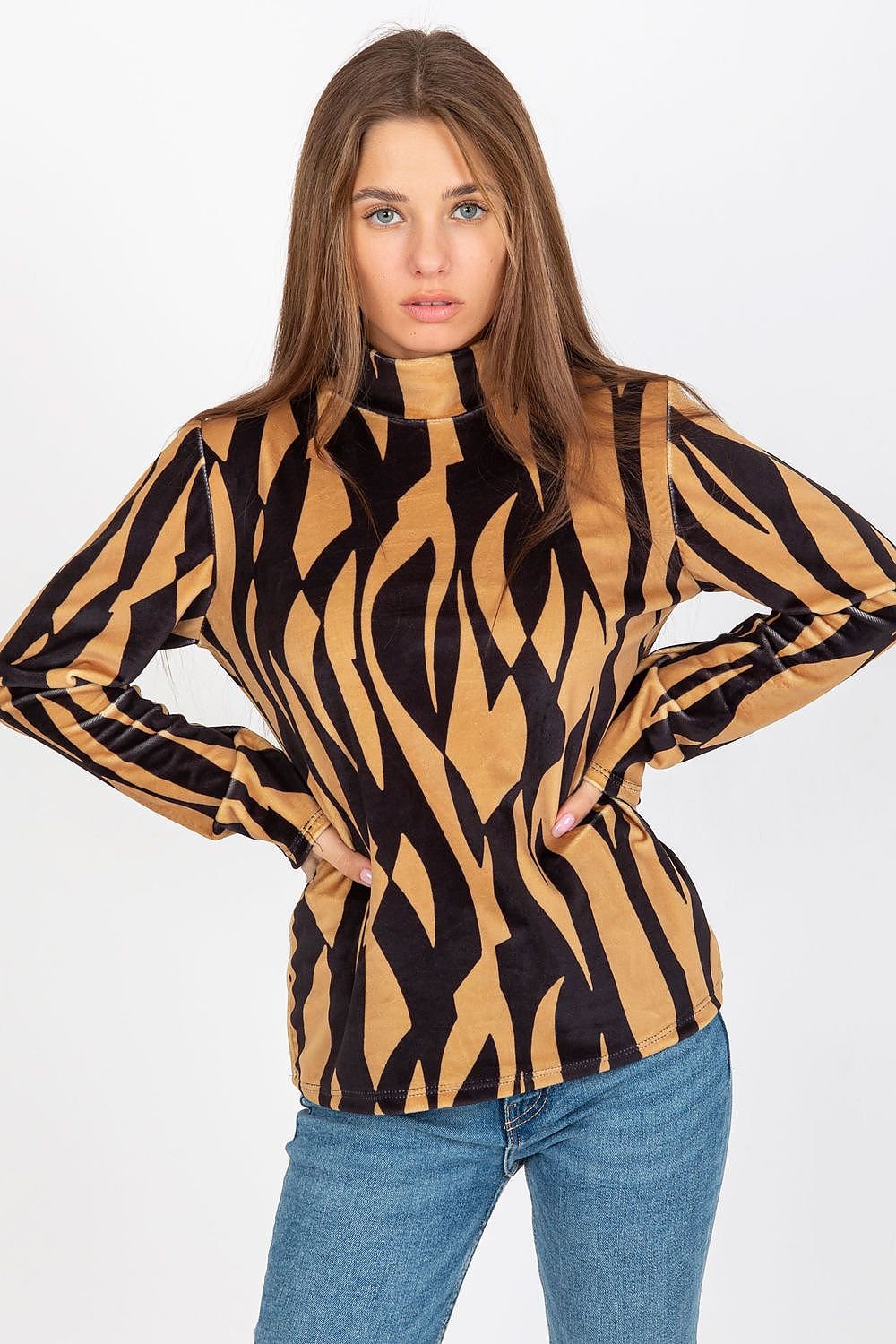 Chic velour blouse with long sleeves, stand-up collar, and an interesting patterned fabric for a stylish and unique look.