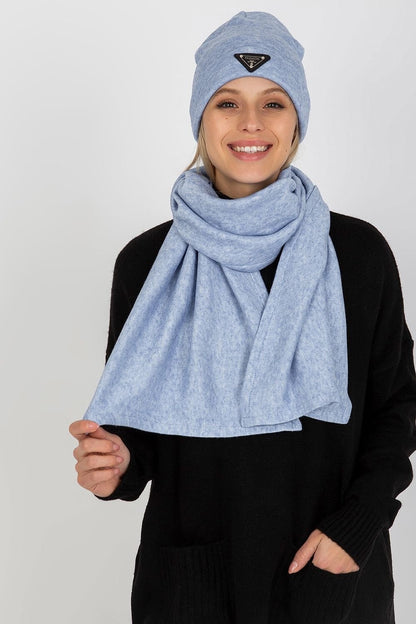 A winter set featuring both a hat and a scarf, offering comfort, warmth, and style for the colder months. Perfect for adding a cozy touch to your winter wardrobe.






