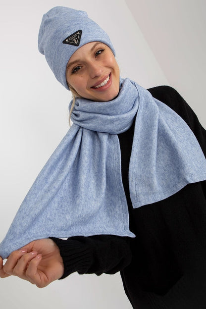 A winter set featuring both a hat and a scarf, offering comfort, warmth, and style for the colder months. Perfect for adding a cozy touch to your winter wardrobe.






