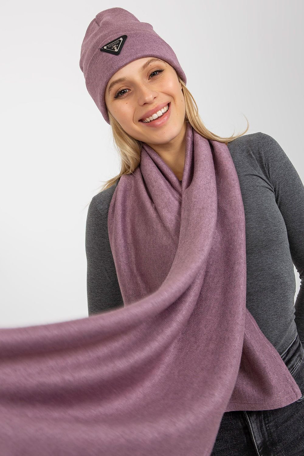 A winter set featuring both a hat and a scarf, offering comfort, warmth, and style for the colder months. Perfect for adding a cozy touch to your winter wardrobe.






