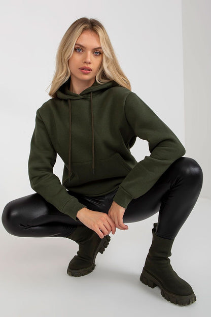 A women's sweatshirt featuring long sleeves, a hood, and a practical kangaroo pocket on the front, offering both comfort and style for casual wear.






