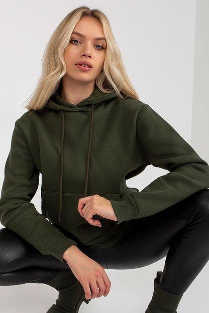 A women's sweatshirt featuring long sleeves, a hood, and a practical kangaroo pocket on the front, offering both comfort and style for casual wear.






