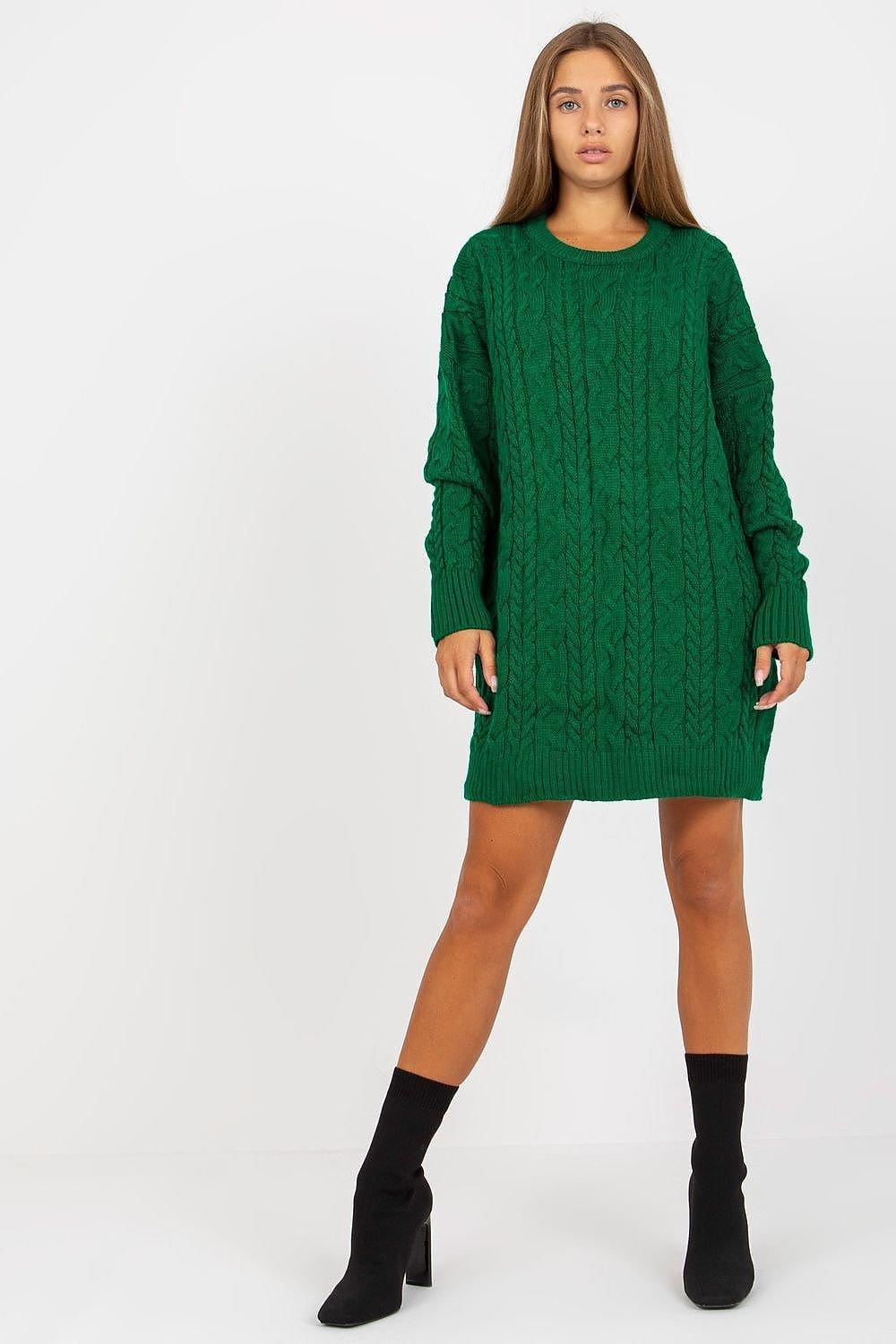 This long sweater is a versatile addition to any wardrobe, designed with long sleeves and a classic round neckline for timeless appeal. Its extended length makes it a perfect match for leggings or slim-fit pants, effortlessly blending comfort with style.

