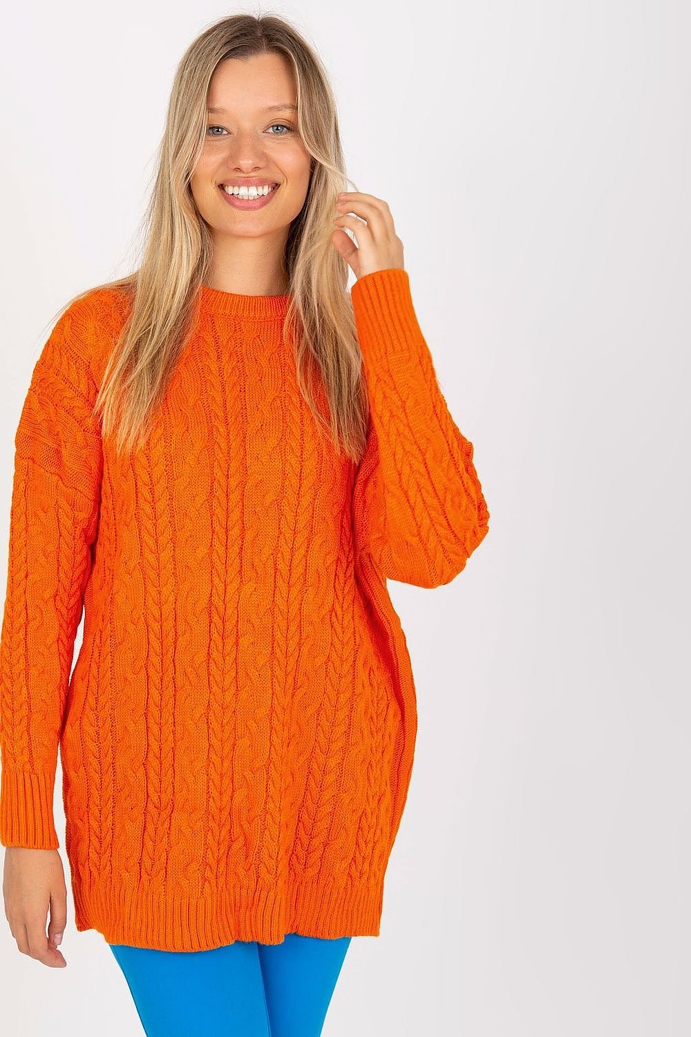 This long sweater is a versatile addition to any wardrobe, designed with long sleeves and a classic round neckline for timeless appeal. Its extended length makes it a perfect match for leggings or slim-fit pants, effortlessly blending comfort with style.

