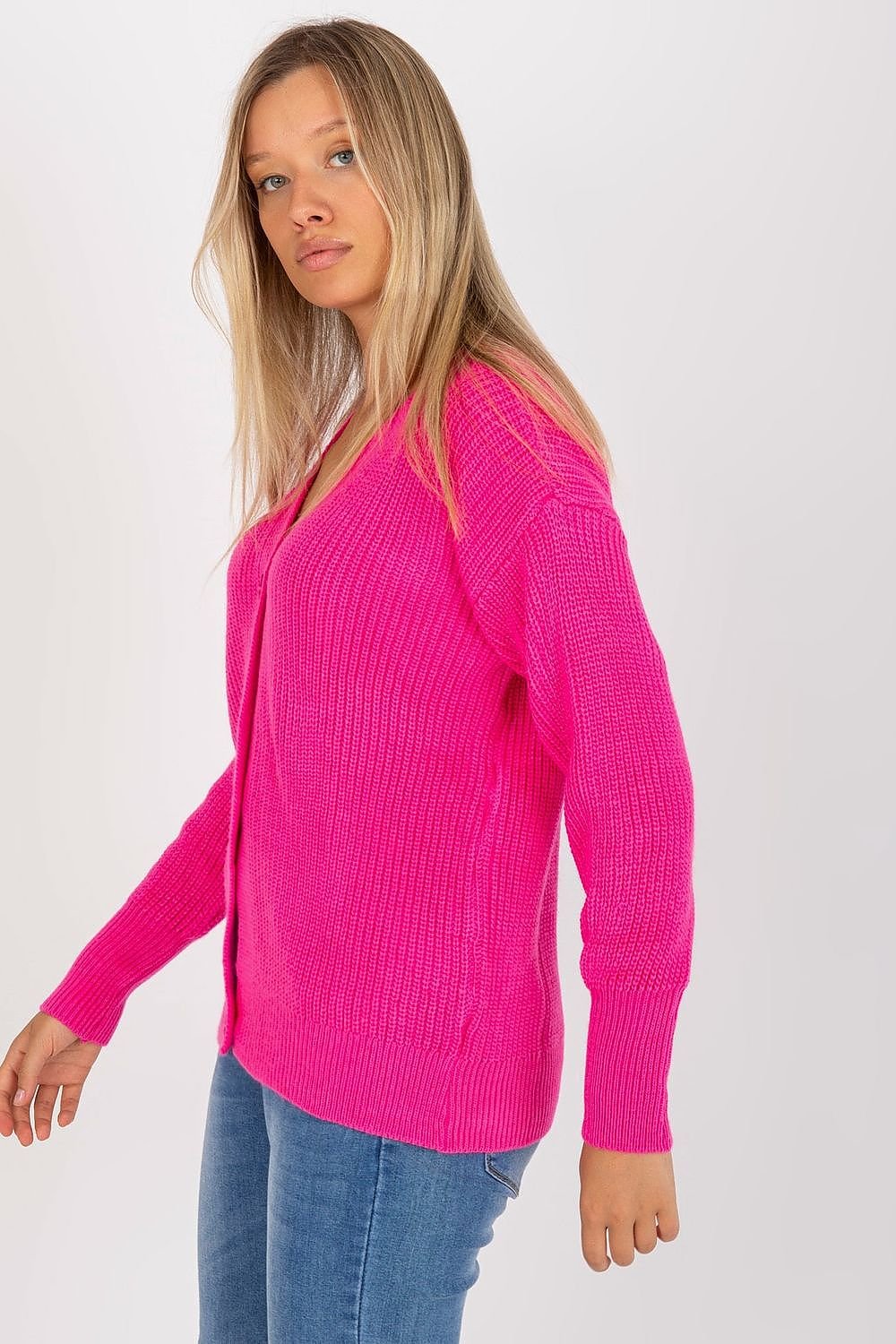 Women's sweater featuring a button closure and long sleeves, perfect for a stylish and cozy look.