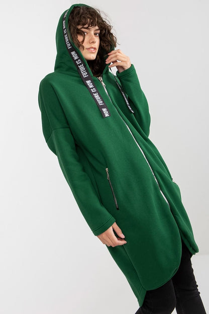 A women's sweatshirt with an extended cut, long sleeves, and a hood. Features a zip-up front and zippered slip pockets on the sides for added functionality.






