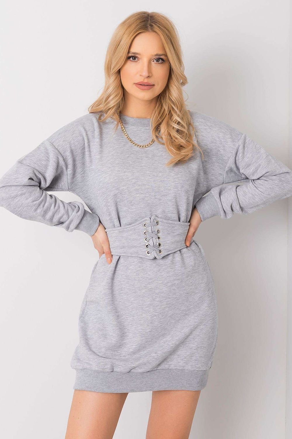 Mini dress with long sleeves, a round neckline, and a matching belt, offering a cohesive and fashionable tracksuit-inspired style.






