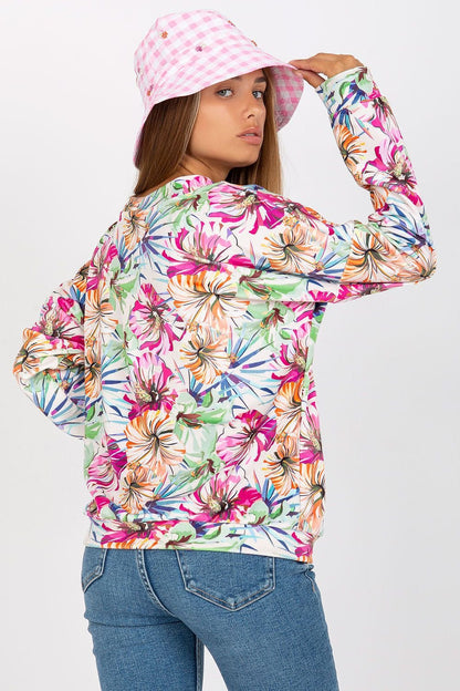 Vibrant velour sweatshirt with long sleeves and a flattering heart-shaped neckline, offering both style and comfort.
