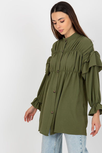 A women's long sleeve button-down shirt featuring a loose cut and decorative ruffles, adding a touch of elegance and style. Perfect for a relaxed yet chic look.






