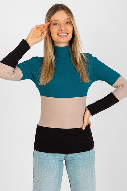 Cozy ribbed sweater featuring a turtleneck and a blend of three complementary colors.