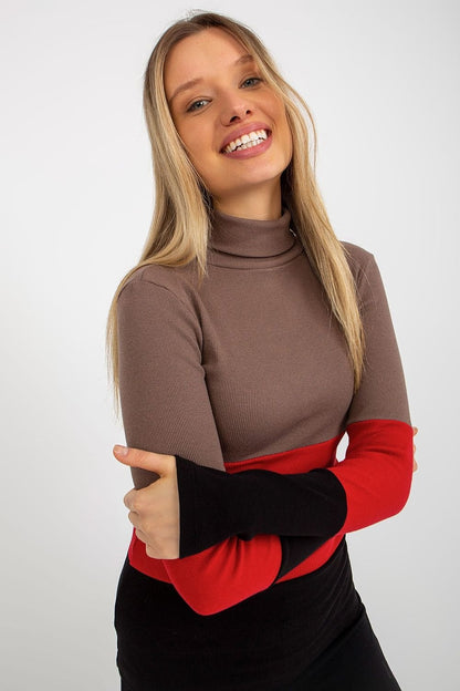 Women's turtleneck sweater with long sleeves, crafted from ribbed fabric in a stylish tri-color design.