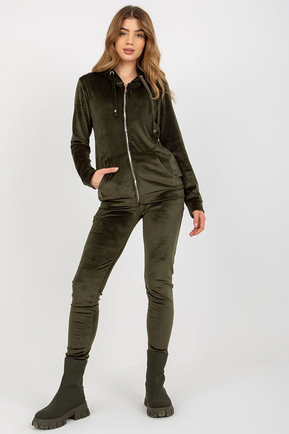 A cozy velour set featuring a zippered sweatshirt with long sleeves and a hood, complete with front slip pockets. The matching long pants have a waist tie and slip pockets on the sides, offering both comfort and style.






