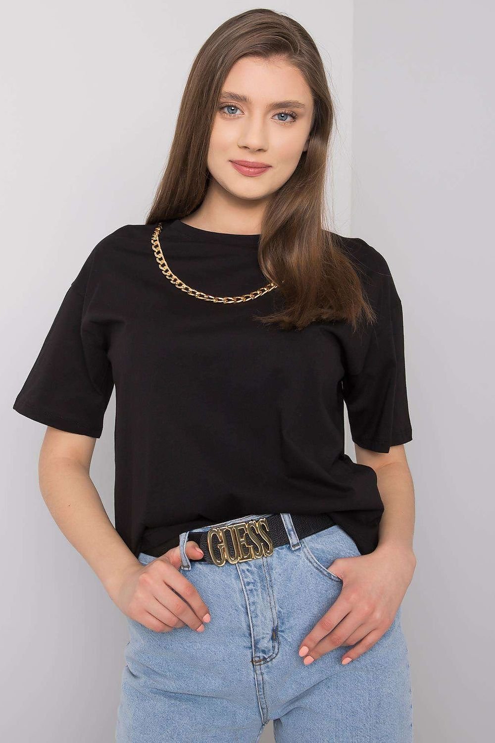 Women's loose-fit t-shirt with short sleeves, a round neckline, and a stylish decorative chain on the front.