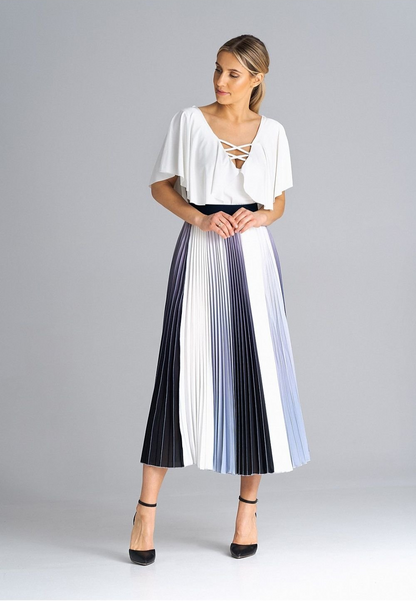 A versatile midi pleated skirt with an elastic waistband, perfect for a variety of occasions, offering comfort and style.






