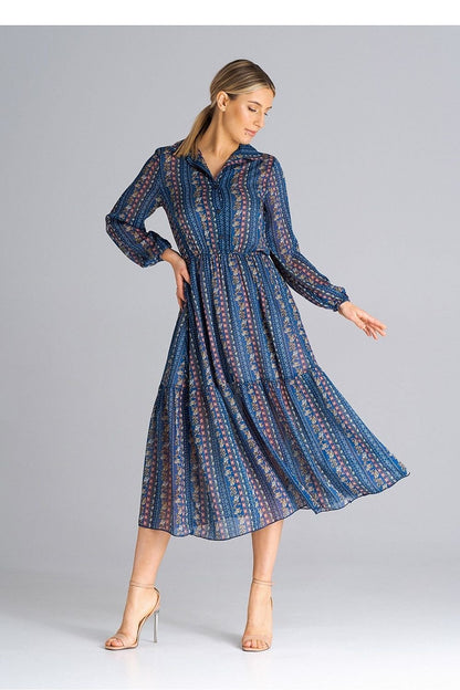 A midi-length, flared, lined dress with long crinkled sleeves with elastic, a collared neckline, a button-down waist, and a wide ruffle at the bottom for a feminine touch.






