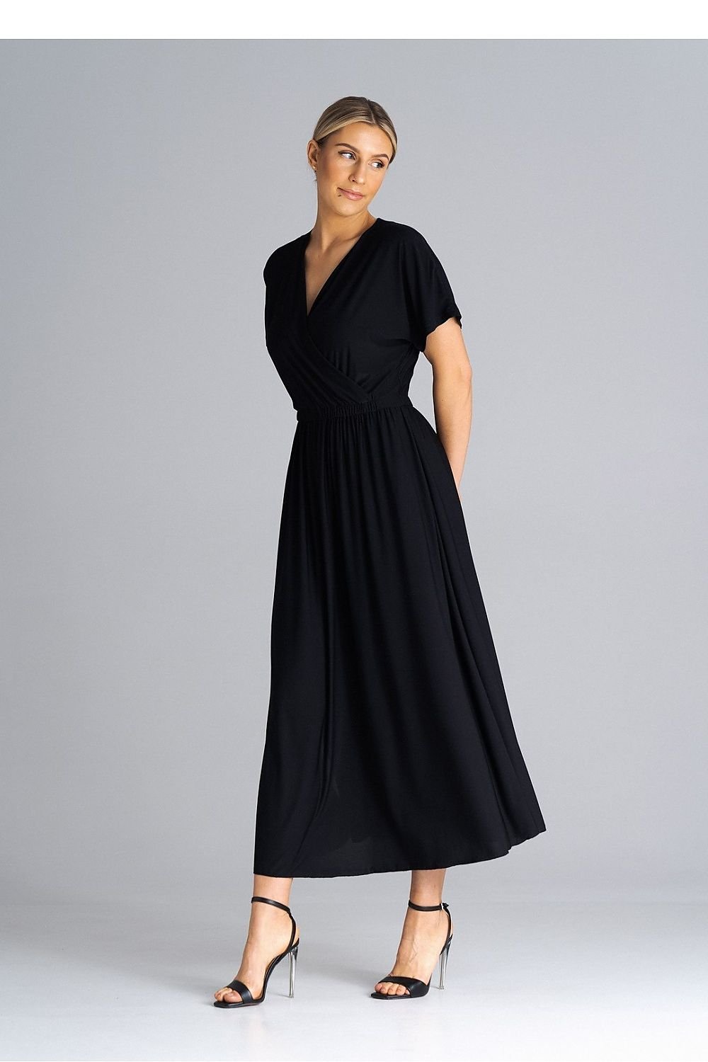 A stylish dress featuring an overlapping neckline, short draped sleeves, an elastic waistband, and asymmetrical side slits for added elegance.






