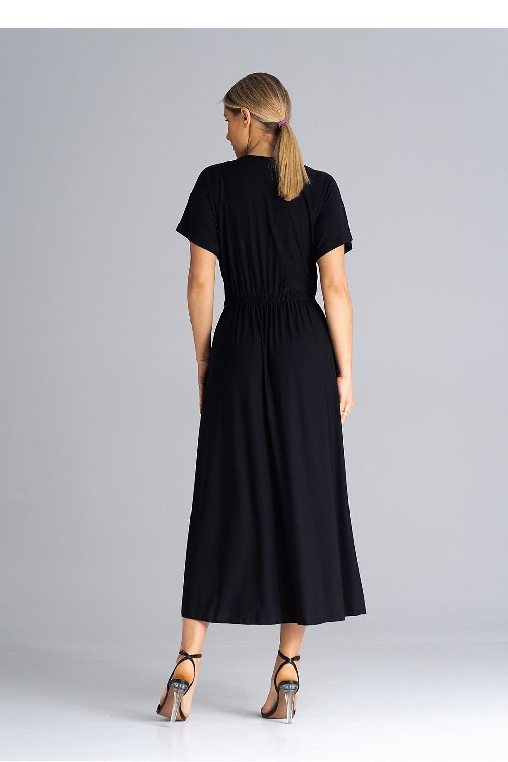 A stylish dress featuring an overlapping neckline, short draped sleeves, an elastic waistband, and asymmetrical side slits for added elegance.






