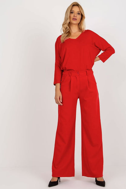 Elegant high-waisted pants with pleats, featuring a button and zipper closure, and slip pockets on the sides for added convenience and style.






