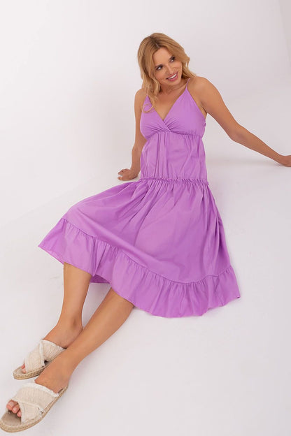 Summer Dress with Adjustable Straps, Envelope Neckline, and Flared Bottom with Decorative Ruffle