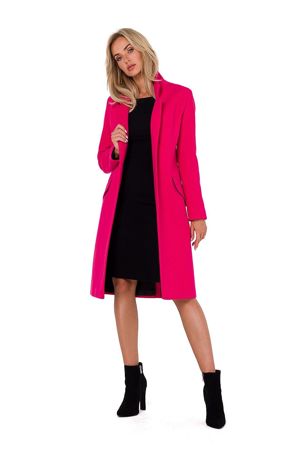 Classic fleece women's coat with padded collar, button closure, asymmetrical front pockets, and fully lined interior. Designed and sewn in Poland.






