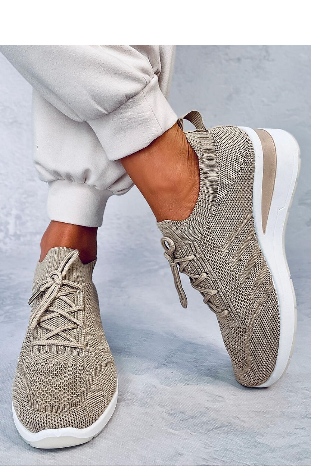 Comfortable women's sock sports sneakers with a 5 cm high anchor sole, made from elastic fabric for a perfect foot fit. These sneakers offer style and comfort, popular among those who value both. Made from fabric for both outer and inner materials.






