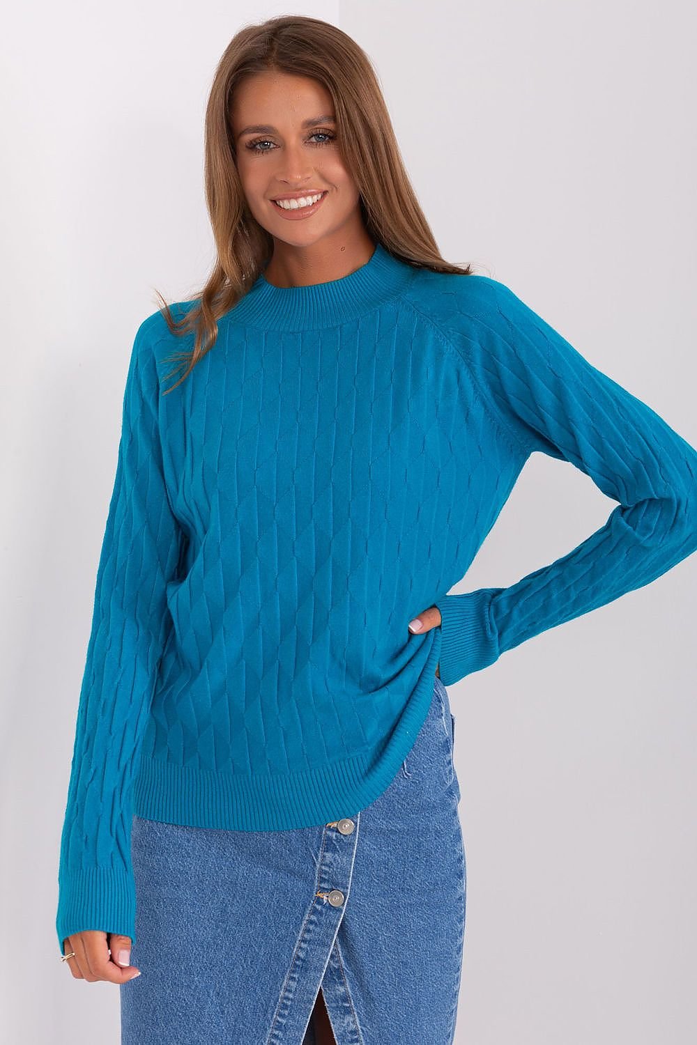 Durable and comfortable women's sweater with a classic round neckline, long sleeves, and a unique variegated fabric texture, perfect for casual wear and easy to pair with pants or skirts.






