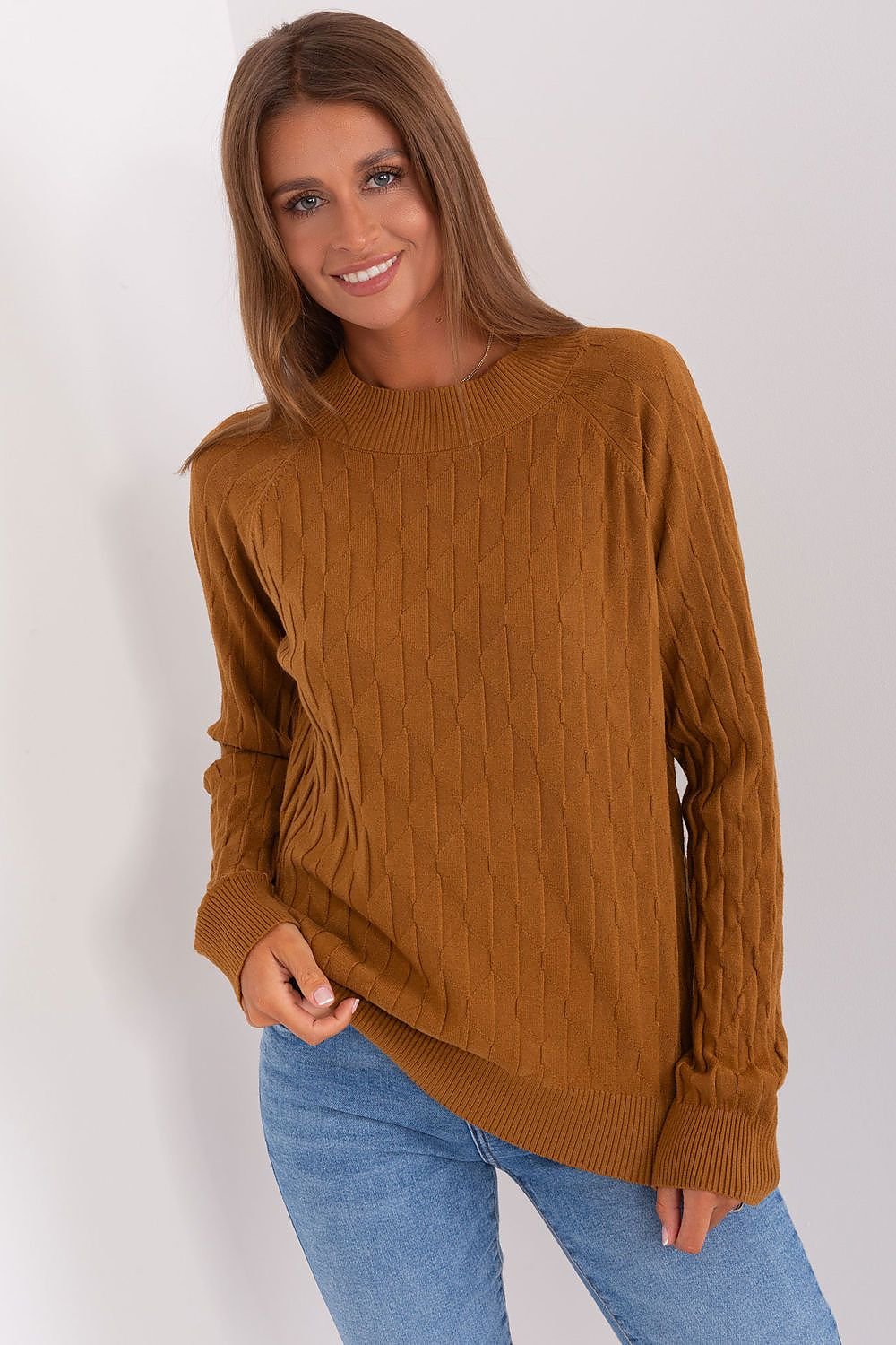 Durable and comfortable women's sweater with a classic round neckline, long sleeves, and a unique variegated fabric texture, perfect for casual wear and easy to pair with pants or skirts.






